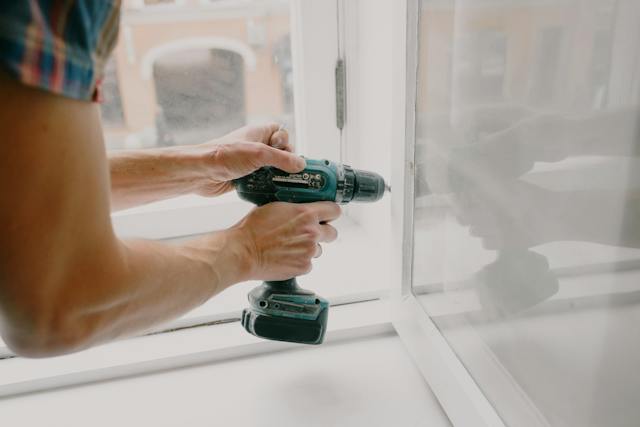 pexels-ksenia-chernaya-5768107 a-person-repairing-windows